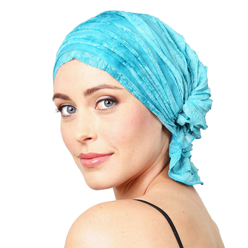 Ruffle provides volume to the look and mimics feeling of hair. How to tie a scarf?---Not! Slip-on headcovers. Not your grandmother's turban plus a feminine sweet look!Molly Chemobeanies® 